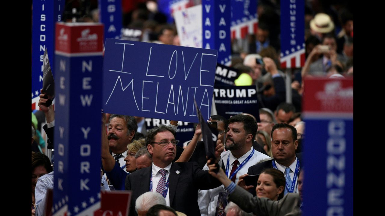 A delegate shows support for Donald Trump's wife, Melania, on Tuesday.