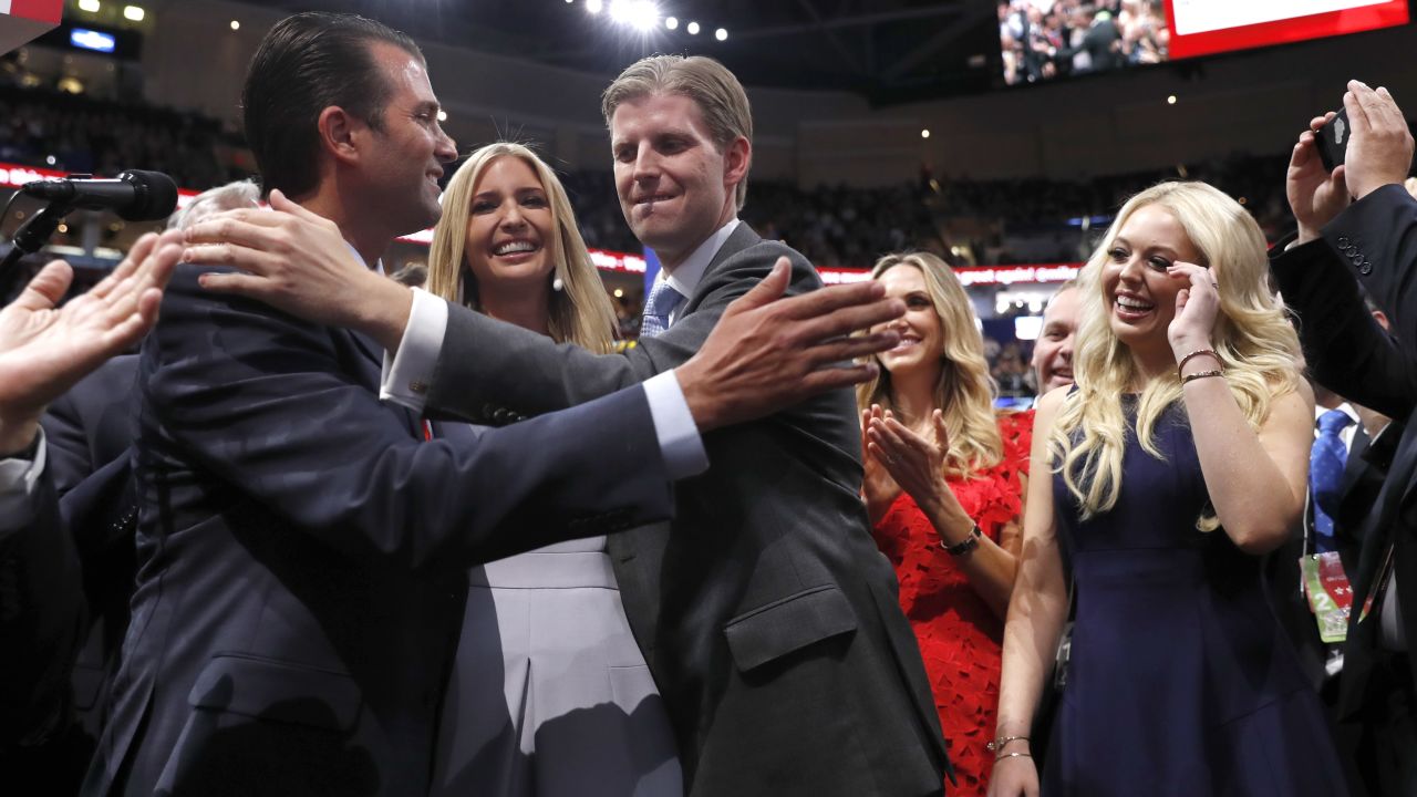 Four of Donald Trump's children -- from left, Donald Trump Jr., Ivanka Trump, Eric Trump and Tiffany Trump -- celebrate on the floor of the convention, where Donald Trump Jr. announced the New York delegates that clinched the nomination for his father.