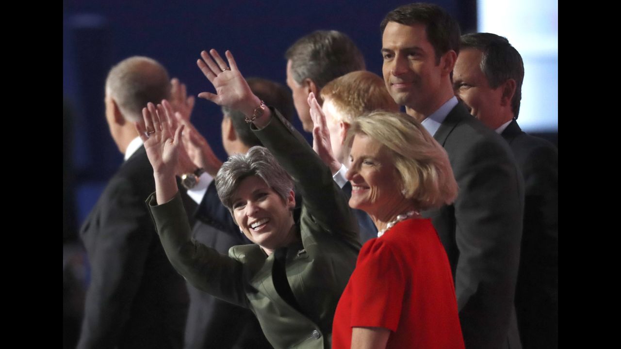 U.S. Sen. Joni Ernst waves as she stands with other first-term senators on Tuesday.