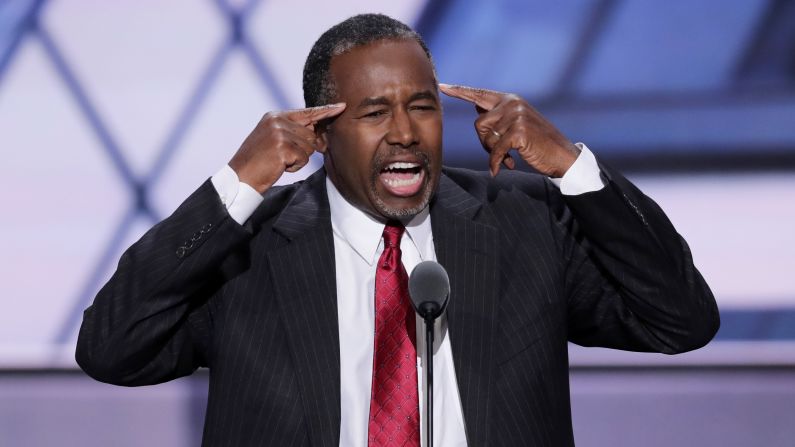 Ben Carson, a retired neurosurgeon and former presidential candidate, speaks on stage Tuesday. He said Trump skeptics who would vote for Hillary Clinton are "not using their God-given brain to think about what they're saying. ... She'll be appointing people who will have an effect on us for generations. And America may never recover."