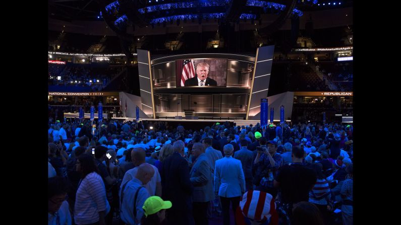 Trump addresses the crowd on Tuesday. "We're going to make America great again," he said in a video message shortly after winning the nomination. "Have a fantastic evening. I'll see you tomorrow night, I'll see you Thursday night, and we will win in November."