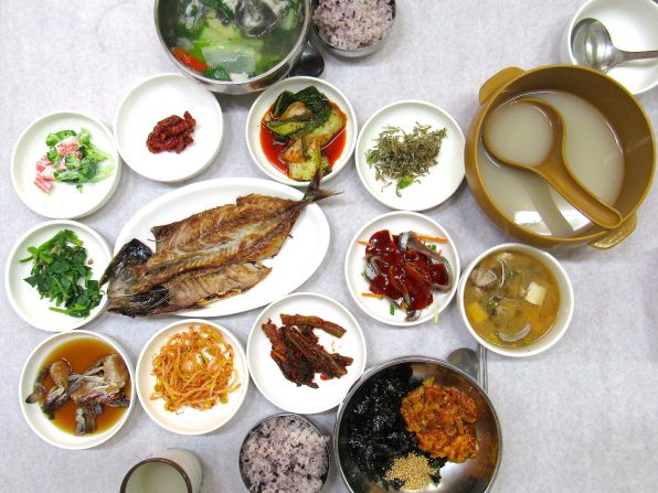 Meonggae (sea pineapple), bibimbap and grilled fish are among the dishes appearing in this spread at local Tongyeong restaurant Donghae Sikdang. 