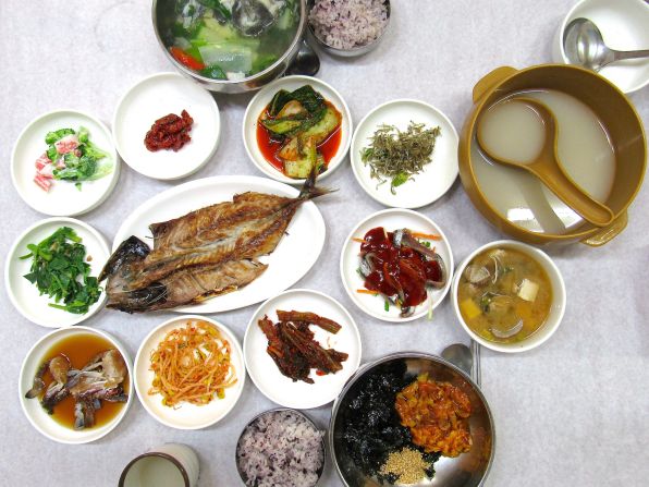 Meonggae (sea pineapple), bibimbap and grilled fish are among the dishes appearing in this spread at local Tongyeong restaurant Donghae Sikdang.