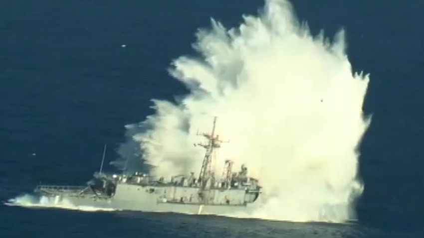 (July 14, 2016) - Aerial video of the sinking exercise (SINKEX) of the decommissioned USS Thach (FFG 43) during Rim of the Pacific 2016. Participants in the exercise include U.S., Canada, Australia, and the Republic of Korea. Twenty-six nations, more than 40 ships and submarines, more than 200 aircraft, and 25,000 personnel are participating in RIMPAC from June 30 to Aug. 4, in and around the Hawaiian Islands and Southern California. The world's largest international maritime exercise, RIMPAC provides a unique training opportunity that helps participants foster and sustain the cooperative relationships that are critical to ensuring the safety of sea lanes and security on the world's oceans. RIMPAC 2016 is the 25th exercise in the series that began in 1971. (U.S. Navy video)