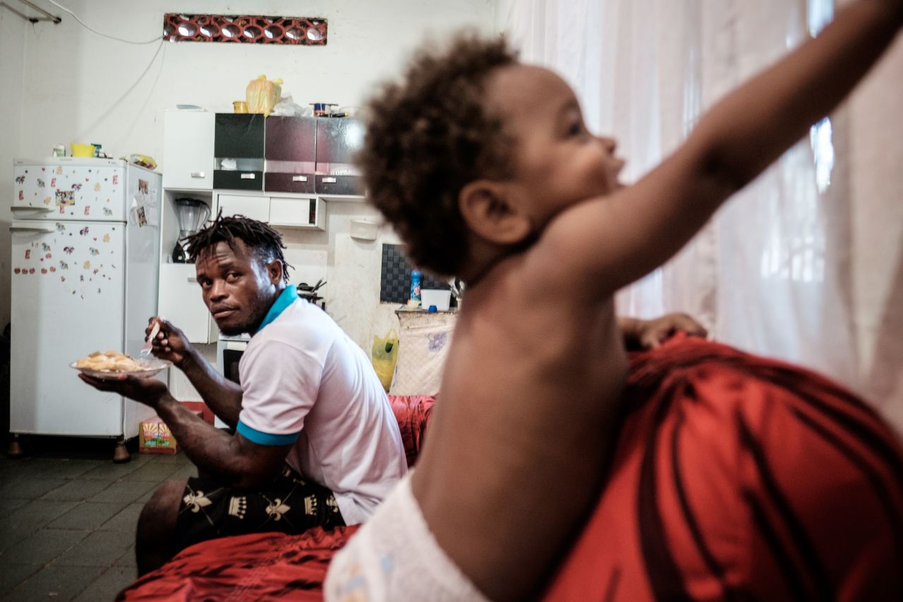 Misenga, 24, has married a Brazilian and has a young son since being granted asylum. He says Rio is a "magical place" to live.