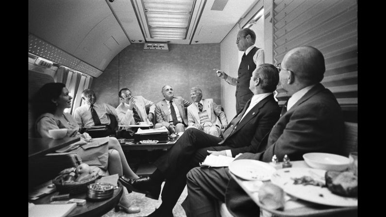Ford, en route to the convention, speaks with staff members and delegates aboard Air Force One. <a href="http://www.cnn.com/2016/07/01/opinions/cnnphotos-david-hume-kennerly-politics/" target="_blank">David Hume Kennerly,</a> Ford's chief White House photographer, was among the group heading to the convention in Kansas City, Missouri.