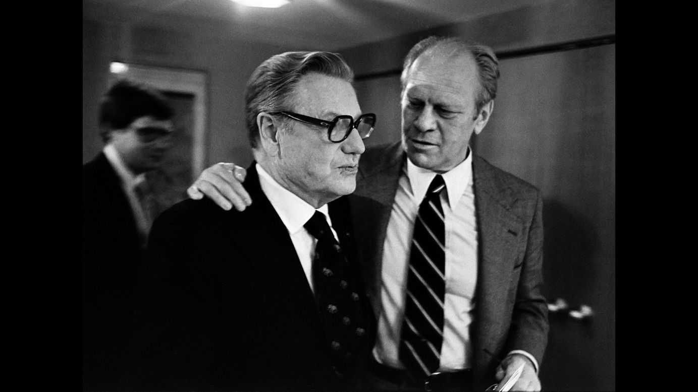 Ford puts his arm around Vice President Nelson Rockefeller in Kansas City. Before the convention, Ford dropped Rockefeller from his ticket. "Advisers felt -- and (Ford) ultimately agreed -- that he needed a more conservative running mate to offset Reagan," Kennerly said. Rockefeller's replacement was U.S. Sen. Bob Dole from Kansas.