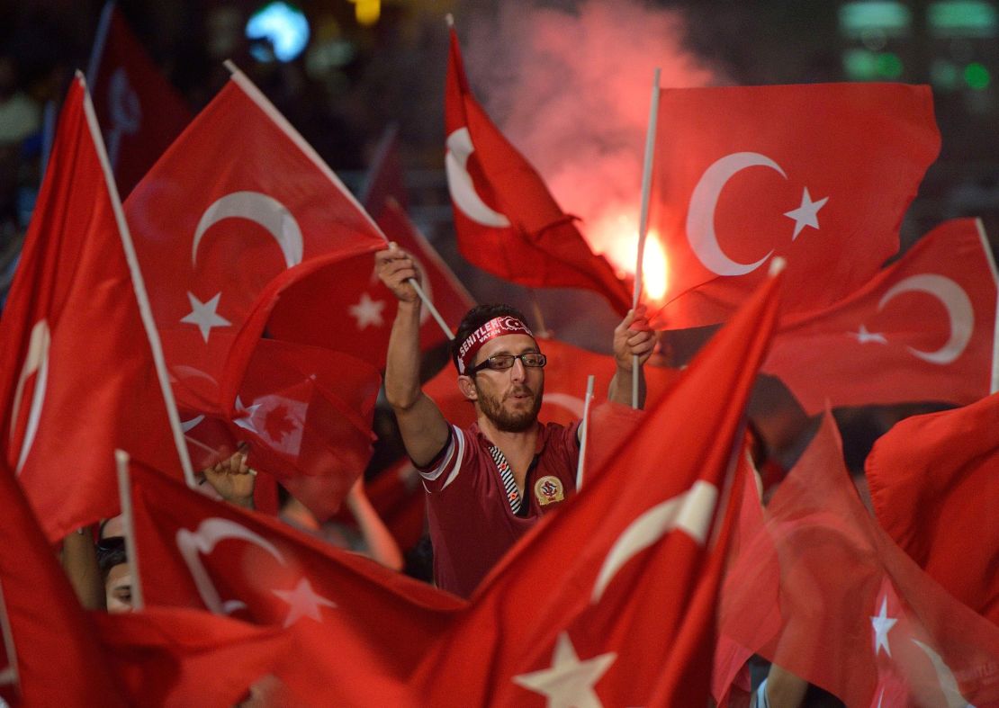 Turkish flags turn Taksim Square into a sea of red. 