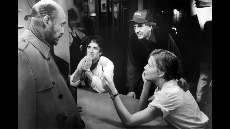 From left, Hector Elizondo, Al Pacino, Marshall and Michelle Pfeiffer work on the set of "Frankie and Johnny" in 1991. 