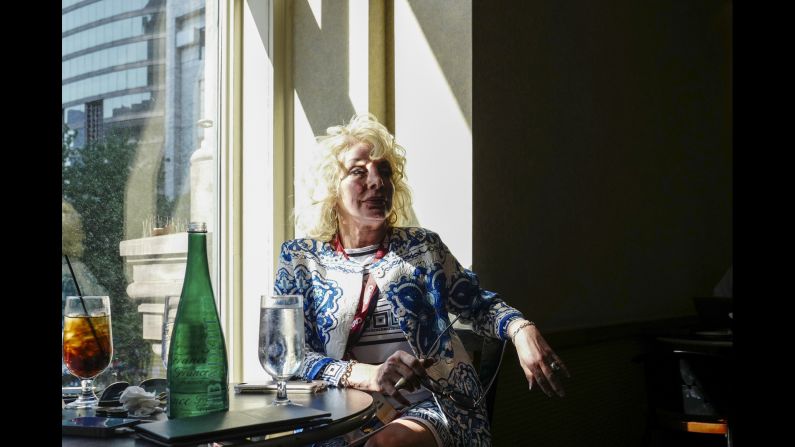 A woman breaks for lunch at a bar near the convention.