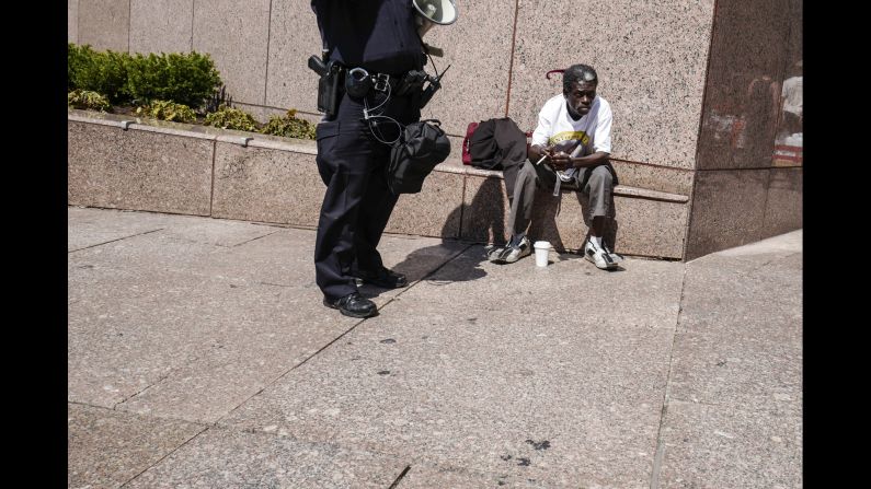 Federal, state and local law enforcement have taken over the city's downtown as iron and concrete barriers throttle typically bustling thoroughfares and choke off pedestrian outlets in the "event zone" surrounding the arena.