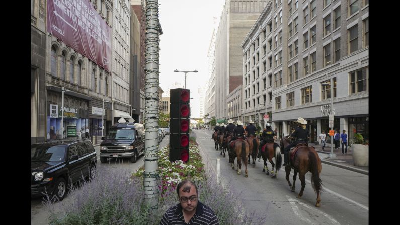 Police patrol Euclid Avenue before the convention started on Wednesday.