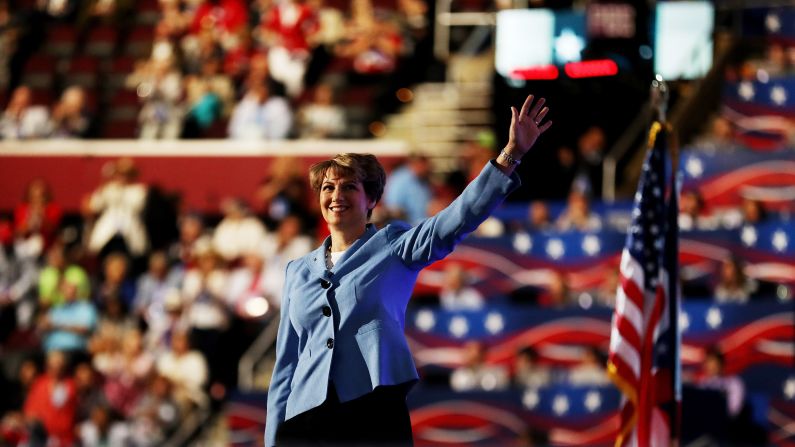 Retired astronaut Eileen Collins waves to the crowd before delivering a speech Wednesday.