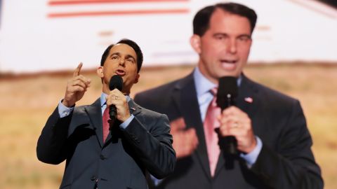 Wisconsin Gov. Scott Walker delivers a speech Wednesday. "A vote for anyone other than Donald Trump in November is a vote for Hillary Clinton," the former presidential candidate said.