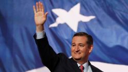 Sen. Ted Cruz (R-TX) waves to the crowd as he walks on stage to deliver a speech on the third day of the Republican National Convention on July 20, 2016 at the Quicken Loans Arena in Cleveland, Ohio. Republican presidential candidate Donald Trump received the number of votes needed to secure the party's nomination. An estimated 50,000 people are expected in Cleveland, including hundreds of protesters and members of the media. The four-day Republican National Convention kicked off on July 18.