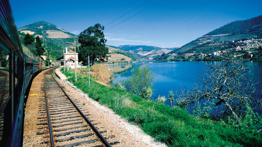 A train ride from Porto along the Douro River Valley provides breathtaking views in Portugal.