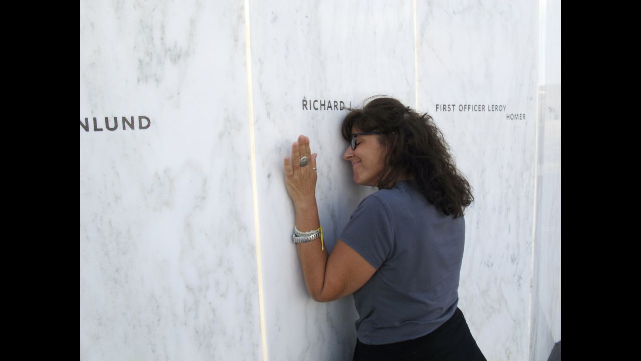 "In September, Lori Guadagno (pictured here) and I headed to one of America's relatively new national parks, one entrusted with telling part of the story of 9/11 and preserving the site of the United 93 crash," wrote Woods. "Lori's brother, Richard Guadagno, was on United Flight 93. He was a U.S. Fish & Wildlife ranger who devoted his life to preserving and protecting natural places."<br />