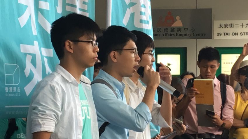 Three Occupy Central leaders, Joshua Wong, Nathan Law and Alex Chow, face the media after being convicted by a Hong Kong court on Thursday July 21.