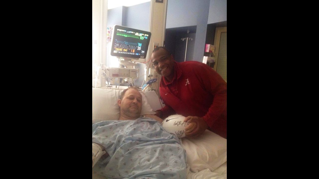 Garner, an avid supporter of the Crimson Tide, pictured with Bobby Humphrey, a record-setting University of Alabama running back who went on to a four-year NFL career with the Denver Broncos before retiring in 1992.
