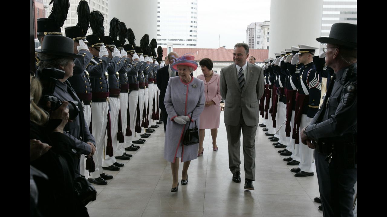 Cadets from the Virginia Military Institute and Virginia Tech salute as Kaine and Britain's Queen Elizabeth II enter the Virginia State Capitol in 2007.
