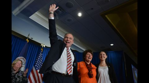 Kaine takes the stage with his wife and daughter Annella after winning his Senate race in 2012. Kaine has three children.