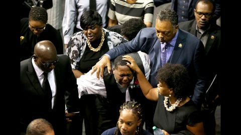 <strong>July 15:</strong> The Rev. Jesse Jackson consoles Alton Sterling's son, Cameron, at Sterling's funeral in Baton Rouge, Louisiana. Sterling, 37, was fatally shot by police in Baton Rouge on July 5. Vigils and memorials <a href="http://www.cnn.com/2016/07/07/us/baton-rouge-alton-sterling-shooting/" target="_blank">spread across the country</a> after cell phone video of the shooting was shared widely on social media. Federal authorities are still investigating what happened.