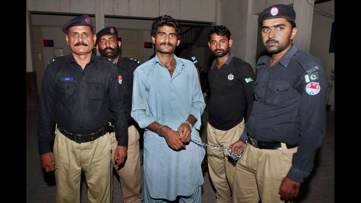 Waseem Azeem, the brother of social media star Qandeel Baloch, is pictured with police after his arrest in Multan, Pakistan, on Sunday, July 17. He <a href="http://www.cnn.com/2016/07/18/asia/pakistan-qandeel-baloch-brother-confession/" target="_blank">confessed to killing his 25-year-old sister</a> because he said she was "bringing dishonor" to the family. Qandeel referred to herself as a "modern-day feminist" and had nearly 750,000 followers on Facebook.