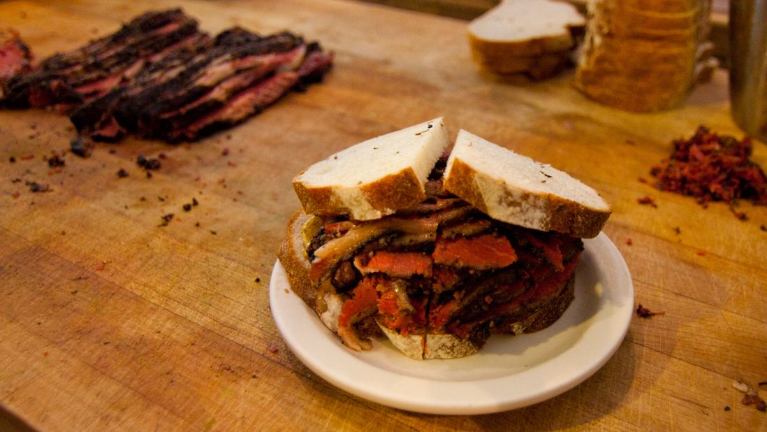 Mile End's uber-popular Smoked Meat Sandwich is packed with dry-cured brisket that's been spiced, smoked and piled high on rye bread (with mustard, natch). 