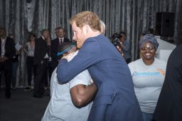 Prince Harry, as he arrived at the International AIDS Conference and greeted someone from his charity, Sentebale.