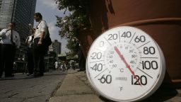 NEW YORK - AUGUST 02:  A thermometer in the sun on the sidewalk indicates a temperature of 120 degrees Fahrenheit as people eat ice cream on the Upper West Side August 2, 2006 in New York City. Forecasters have called for high temperatures of 100 degrees in the city with the heat wave continuing through tomorrow.  (Photo by Chris Hondros/Getty Images)