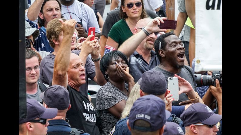 People heckle protesters from Westboro Baptist Church, the controversial congregation known for its anti-gay views. 