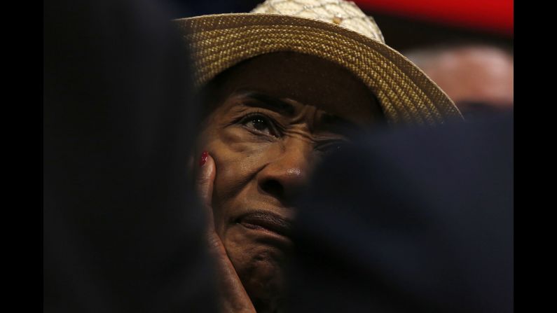 A delegate listens to Trump's speech.