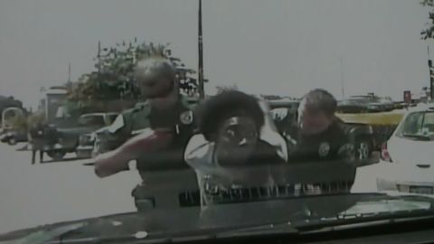 Dashcam video shoes Ms. King being arrested.