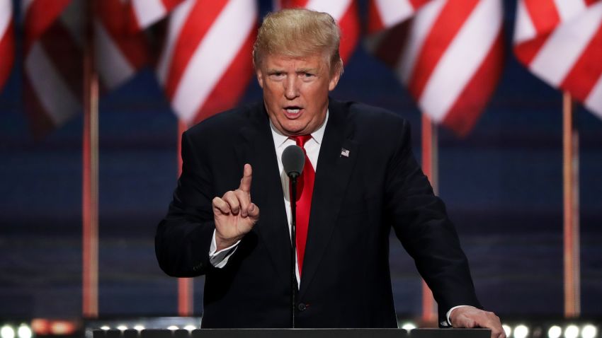 Republican presidential candidate Donald Trump delivers a speech during the evening session on the fourth day of the Republican National Convention on July 21, 2016 at the Quicken Loans Arena in Cleveland, Ohio. Republican presidential candidate Donald Trump received the number of votes needed to secure the party's nomination. An estimated 50,000 people are expected in Cleveland, including hundreds of protesters and members of the media. The four-day Republican National Convention kicked off on July 18.