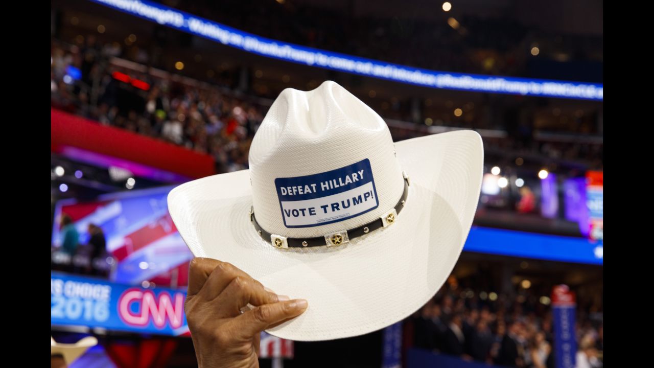 A Texas delegate raises his hat on the final night of the Republican National Convention in Cleveland. Photographer Martin Parr, who is known for humorously capturing the quirks of British life, was attending his first political convention in the United States.