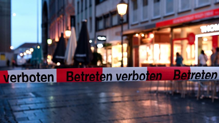 Police sign blocks the entrance to Odeon square following shootings at a shopping mall earlier on July 22, 2016 in Munich.
Six people were killed and several gravely injured on Friday in a shooting rampage at a Munich shopping centre, with the attackers still believed to be at large. / AFP / dpa / Sven Hoppe / Germany OUT        (Photo credit should read SVEN HOPPE/AFP/Getty Images)