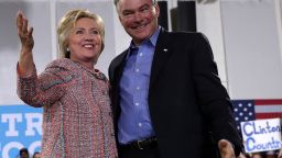 ANNANDALE, VA - JULY 14:  Democratic presidential candidate Hillary Clinton (L) and U.S. Sen. Tim Kaine (D-VA) (R) acknowledge the crowd during a campaign event at Ernst Community Cultural Center at Northern Virginia Community College July 14, 2016 in Annandale, Virginia. Hillary Clinton continued to campaign for the general election in November.  (Photo by Alex Wong/Getty Images)