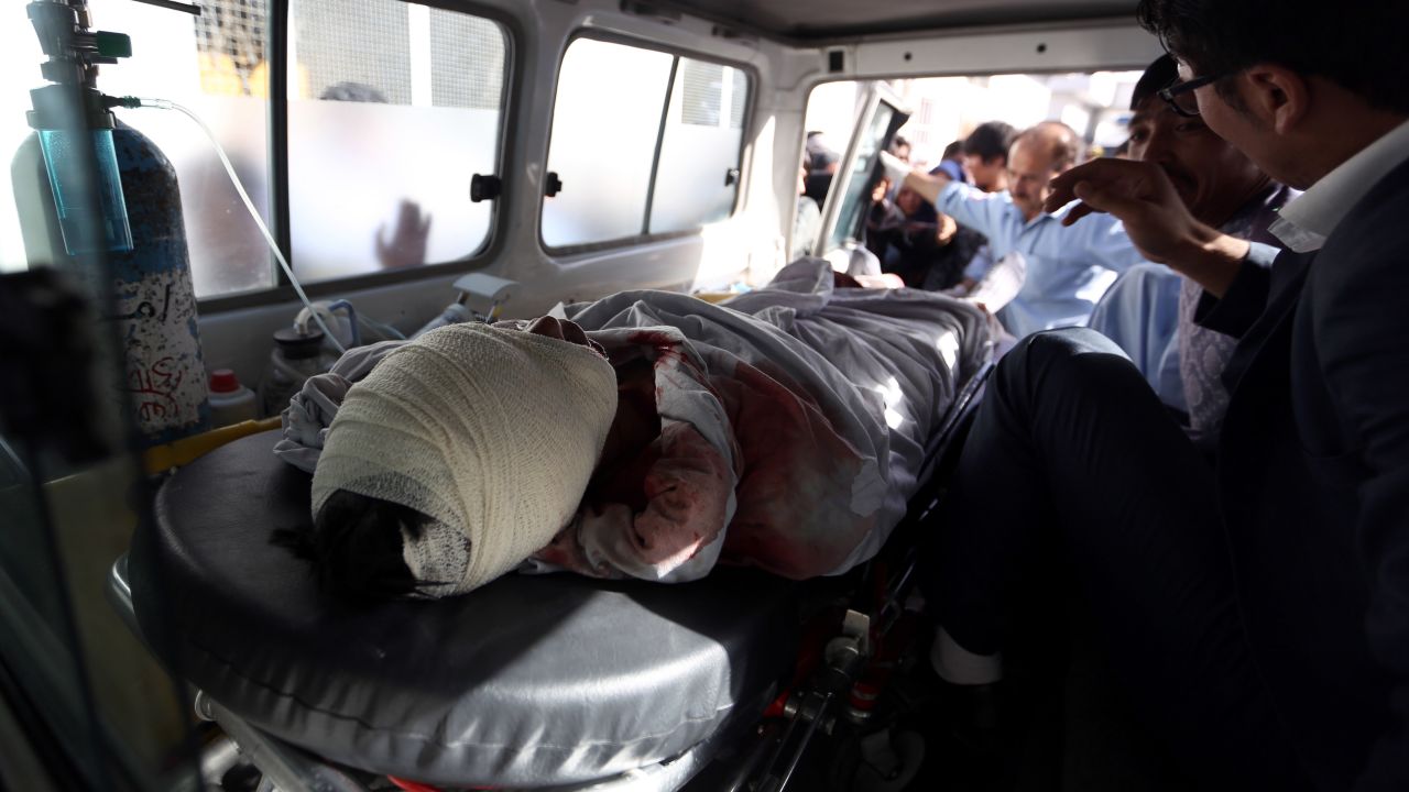 An injured man is moved in an ambulance after the explosion.