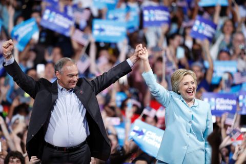 Presumptive Democratic presidential nominee Hillary Clinton arrives with Sen. Tim Kaine at a rally in Miami on Saturday, July 23. Clinton has selected Kaine as her running mate. Kaine has represented Virginia in the Senate since January 2013. He was governor from 2006 to 2010. 