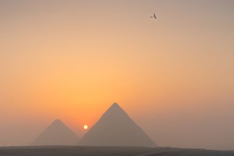 Solar Impulse 2, seen above the Pyramids of Giza on its approach to Cairo, Egypt. 