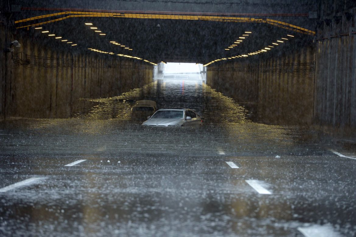 Cars are submerged by floodwater in Beijing on July 20. This year's flood season has been the worst since 1998, according to state media,  with 26 provinces affected. The 1998 floods led to the deaths of almost 4,000 people. 