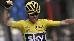 Chris Froome celebrates as he crosses the finish line to win the 103rd edition of the Tour de France cycling race.