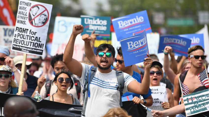 Bernie Sanders supporters march through downtown on the first day of the Democratic National Convention (DNC) on July 25, 2016 in Philadelphia, Pennsylvania. The convention is expected to attract thousands of protesters, members of the media and Democratic delegates to the City of Brotherly Love.