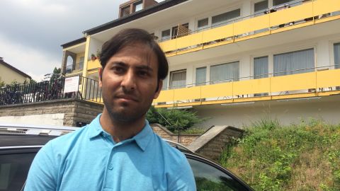 Mubariz Mahmoof from Pakistan (pictured), a neighbor of the the Ansbach bomber, told CNN the attacker was general "friendly and happy."