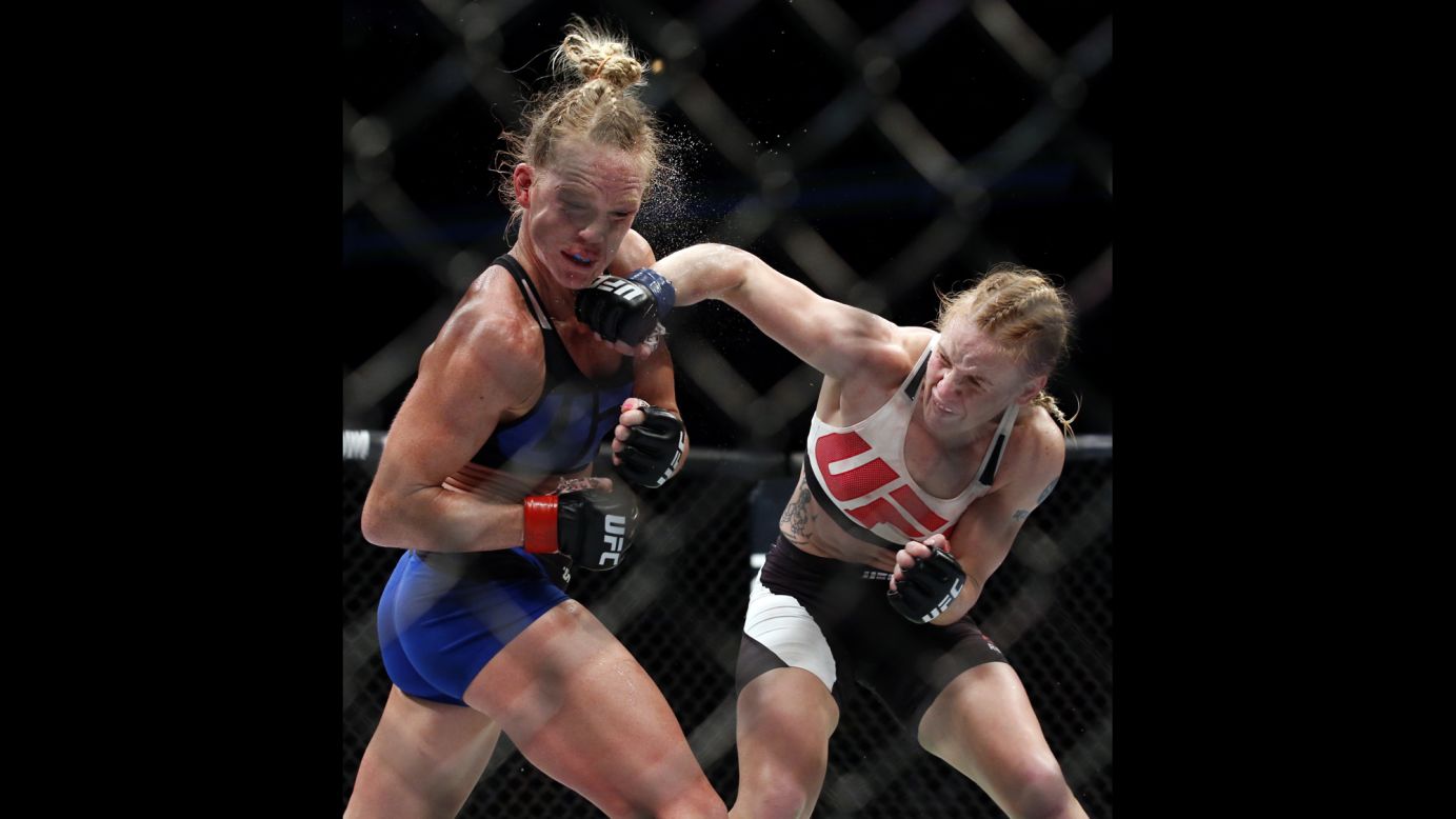 Valentina Shevchenko punches Holly Holm during a UFC bout in Chicago on Saturday, July 23. Shevchenko won by unanimous decision.