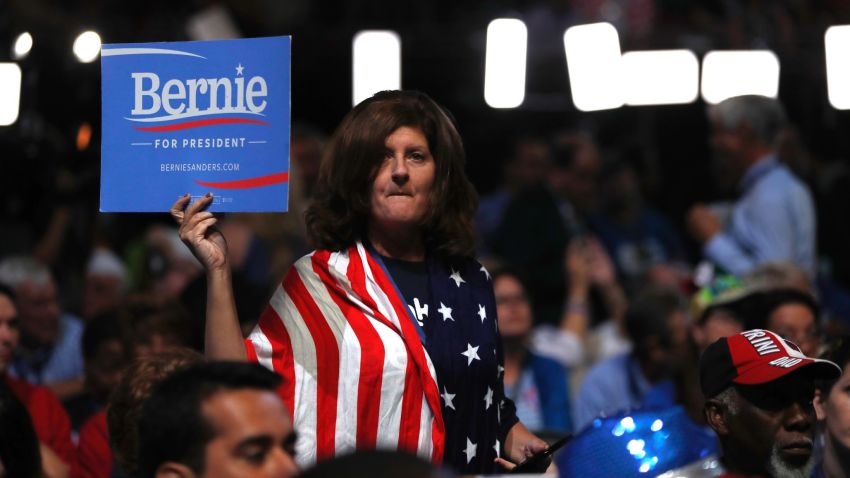 A delegates holds up sign showing her support for Former Democratic Presidential candidate, Sen. Bernie Sanders, I-Vt., during the first day of the Democratic National Convention in Philadelphia , Monday, July 25, 2016. \