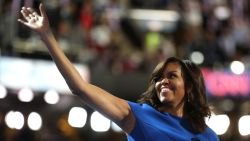 First lady Michelle Obama acknowledges the crowd before delivering remarks on the first day of the Democratic National Convention at the Wells Fargo Center, July 25, 2016 in Philadelphia, Pennsylvania. An estimated 50,000 people are expected in Philadelphia, including hundreds of protesters and members of the media. The four-day Democratic National Convention kicked off July 25.