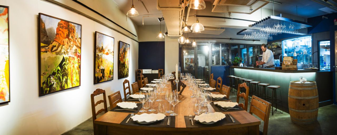 Dine Art is an open kitchen and art space in the industrial area of Wong Chuk Hang. 