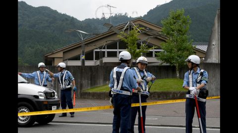 Police officers cordon off the entrance to the Tsukui Yamayuri-en center. The attacker has been identified as 26-year-old Satoshi Uematsu, a man who had worked at the facility until February. After breaking in through a window and carrying out the attack, Uematsu turned himself into local police, officials said.