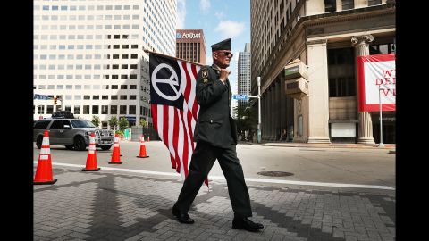 Lou Pumphrey, who is with the nonprofit Veterans for Peace, walks through downtown Cleveland on Sunday, July 17, ahead of the <a href="http://www.cnn.com/2016/07/20/politics/gallery/outside-rnc-van-agtmael/index.html" target="_blank">Republican National Convention.</a>